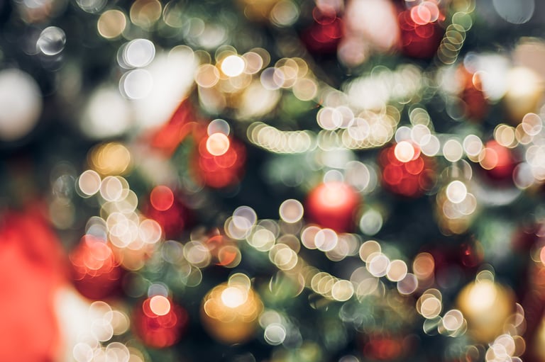Colorful decoration balls and string lights glowing with bokeh background